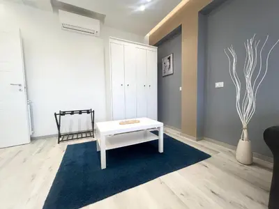 a bedroom with a bed with a television on it at Domus Tiber in Rome