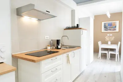 a room with a mirror and a bedroom at Domus Tiber in Rome