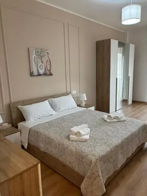 a bedroom with a bed with two towels on it at Inn Rhome 71 in Rome