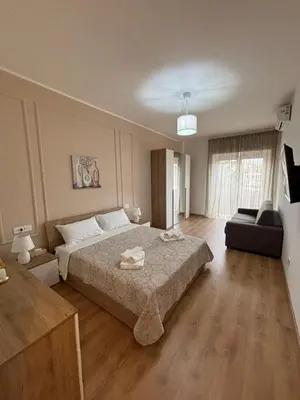 a large bedroom with a bed and a couch at Inn Rhome 71 in Rome