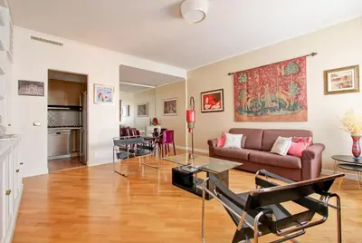 a living room with a couch and a table at Roberta Apartment Fontana di Trevi in Rome