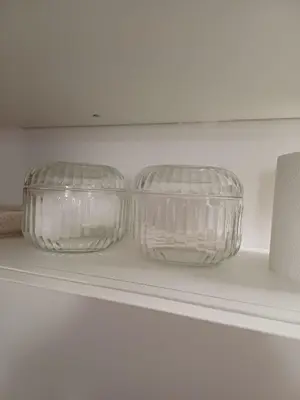 two glass bowls sitting on a shelf in a refrigerator at Divine Terrace Stylish Apartment St Peter Rome in Rome