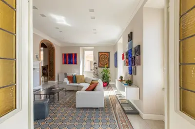 a living room with a couch and a table at iFlat Timeless Elegance in the Center of Rome in Rome