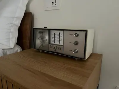 a television sitting on top of a wooden table at Quattro fiori apartment in Rome