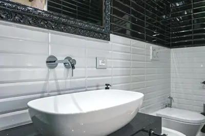 a bathroom with a white tub and a toilet at Dreamers in Belsiana Spagna int 8 in Rome