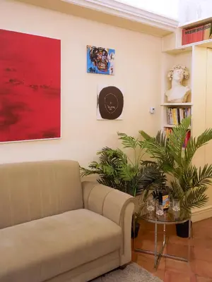 a living room with a couch and a table at Best Location in Rome -Historical Center in Rome