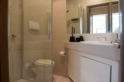 a bathroom with a shower and a toilet and a sink at Pantheon Deluxe in Rome