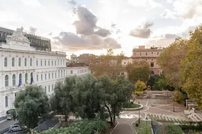 a view of a city with buildings and trees at Luxury Suite Dante Elegante Appartamento di Lusso nel Cuore di Roma in Rome
