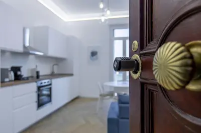 a door to a kitchen and a kitchenasteryasteryasteryasteryasteryasteryasteryastery at Nomentana Home in Rome
