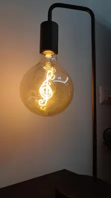 a light fixture with a music note on it at Melodies Of Rome in Rome