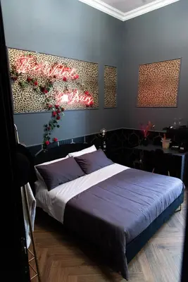 a bedroom with a large bed in a room at One of one experiences - LOVE ROOM in Rome