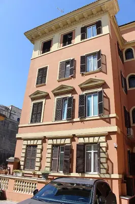a building with a car parked in front of it at Porta del Vaticano in Rome