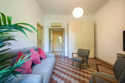 a living room with a couch and a chair at Casa Mia in Rome
