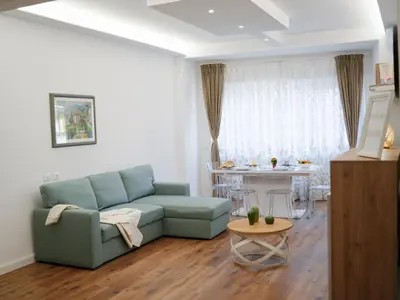 a living room with a couch and a table at La Casa dei Lettori in Rome
