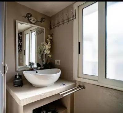 a room with a bed and a book shelf at Vatican Apartaments Holiday in Roma in Rome