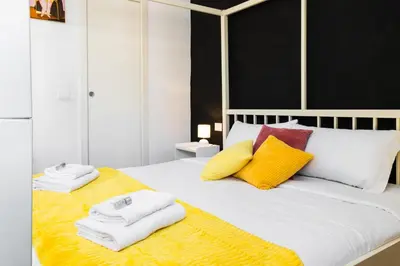 a bedroom with a bed with towels on it at Casa Medea in Rome