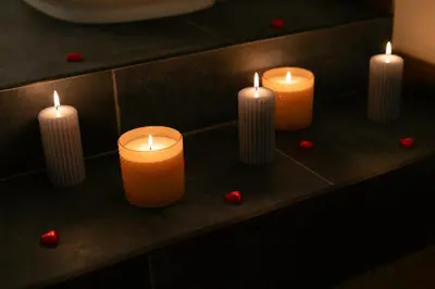 a group of candles sitting on a counter with cherries at Elegant Apartment Minelli Navona by GHOR in Rome