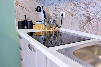 a bathroom with a sink and a counter with a faucet at Nala's Vatican House in Rome