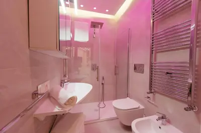 a bathroom with a sink and a toilet and a shower at 30' Walk Vatican & Stadium Art, Smart Home in Rome