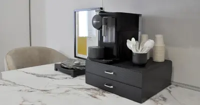 a black dresser with a mirror on top of it at YCH-Vatican Superior Suite in Rome