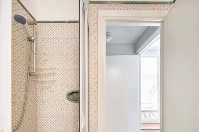 a bathroom with a shower with a mirror at Nido degli Artisti in Trastevere Piazza Trilussa in Rome
