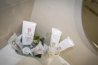 a white counter with a bunch of products on it at Roma Vaticano Deluxe in Rome