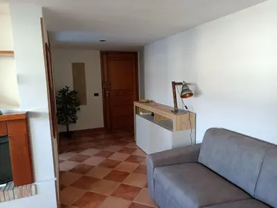 a living room with a couch and a table at Attico GianLuce in Rome