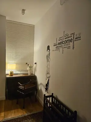 a room with a wall with a picture of a man on it at B&B CasaBentivoglio in Rome