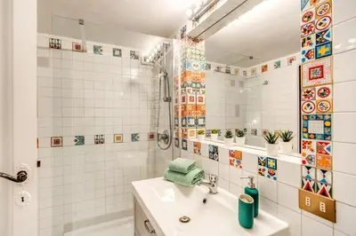 a bathroom with a sink and a shower at Link Campus Apartment in Rome