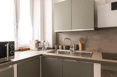 a kitchen with a sink and a microwave at Comfort Suite Balduina - Rome in Rome