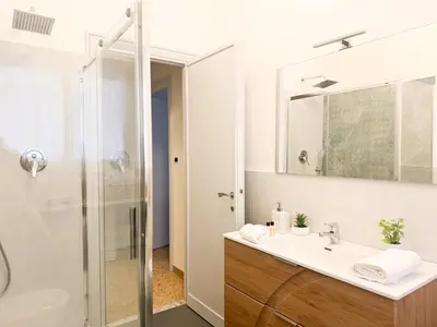 a bathroom with a sink and a shower at Il Sogno di Balduina a 1 min Stazione Appiano-Ospedale Gemelli in Rome