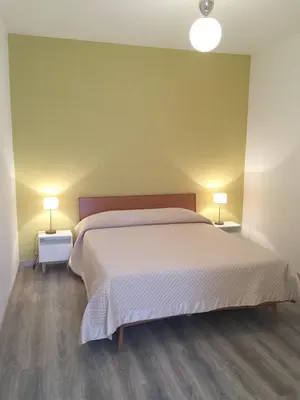 a white bathroom with a sink and a shower at Centro Roma Grande - LOCAPPART in Rome