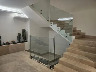 a staircase with a glass case in a room at Colosseum Luxury suite 26 in Rome