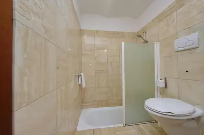 a bathroom with a toilet and a shower at Rifugio segreto nel cuore di Roma in Rome