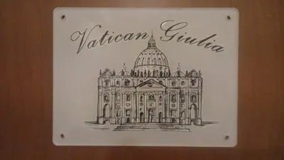 a drawing of a building on a wall at Vatican Giulia in Rome