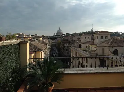 a view of a city from a balcony at St Peter Vatican wonderfull view apartment in Rome