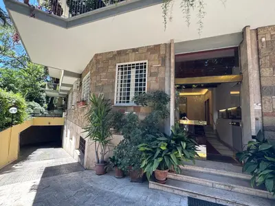 a building with potted plants in front of it at Appia 101 Guest House in Rome