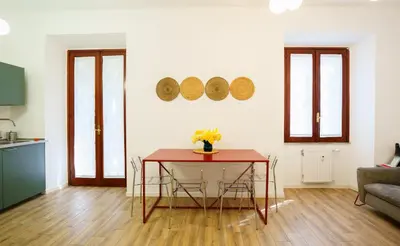 a bedroom with a large bed in a room at Simi Roma Palombini, Appartamento con Giardino in Rome