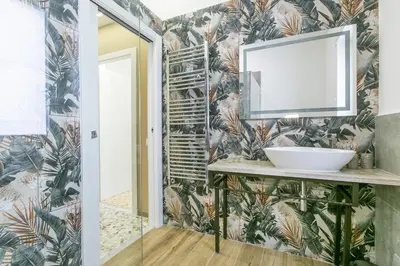 a bathroom with a sink and a mirror at Casa Leone in Rome
