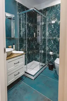 a bathroom with a shower with a toilet and a sink at Vatican LeM collection in Rome
