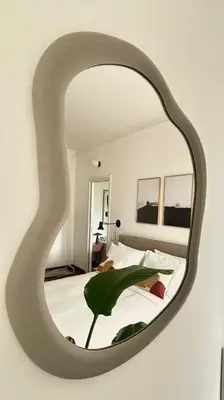 a bedroom with a large white bed with two lamps at Casa Mazz San Giovanni in Rome