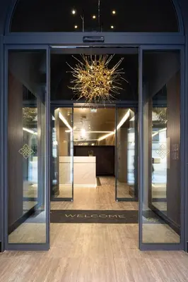 a store front with a chandelier in a building at Palazzo 4 Fontane 12 in Rome