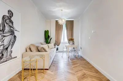 a living room with a couch and a table at Vatican Design Apartment - NEW! in Rome