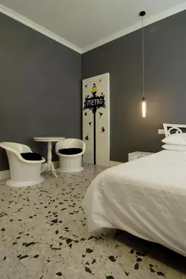 a bedroom with two toilets and a bed and two sinks at B&B Tiburtina Garden in Rome