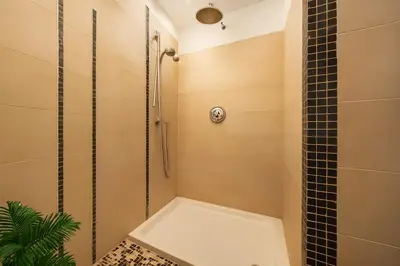 a bathroom with a shower and a toilet and a sink at RELAX Palace in Rome