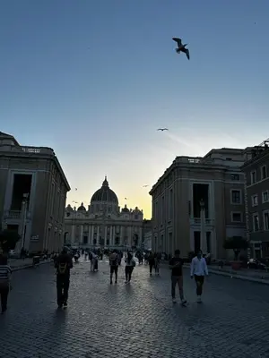 a group of people walking in front of a building at Le Case di Emma in Rome