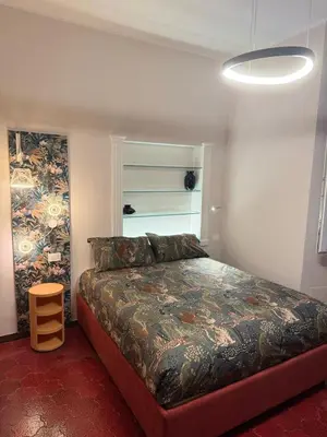a bedroom with a bed in a room at Suite 41 in Rome