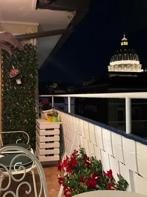 a view of a balcony with a capitol building at Saint Peter's Sunset View Luxury Apartment in Rome