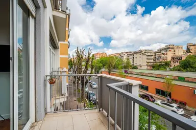a balcony with a view of a city at Rome Centre - Spacious Apartment - Jacuzzi - AC - WiFi in Rome