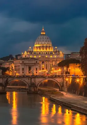 a view of a building with a bridge over a river at Rome Centre - Spacious Apartment - AC - Wi-Fi - Metro in Rome